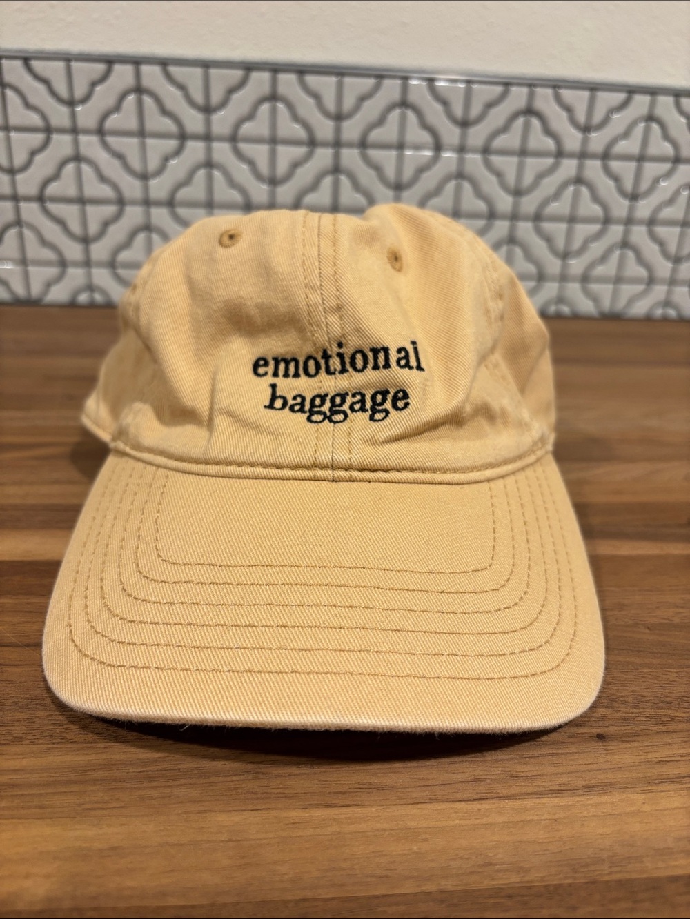 Embroidered "emotional baggage" Beige dad hat
